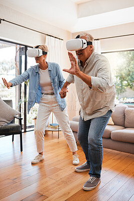 Buy stock photo Metaverse, gaming and elderly couple with a futuristic virtual reality headset to experience a digital game at home. Future, old man and elderly woman enjoying a 3d vr game in the house living room