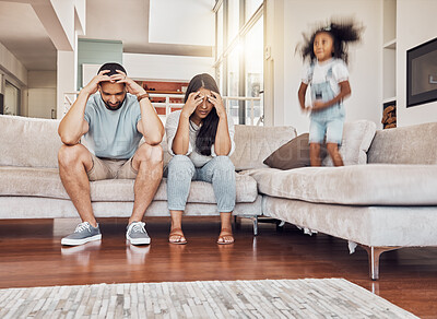 Buy stock photo Tired parents, frustrated and active child being naughty and playful, adhd daughter playing by upset, stressed and depressed mother and father at home. Energy of girl kid jumping by man and woman