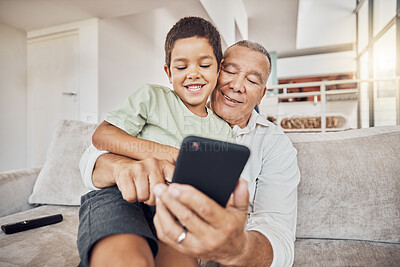 Buy stock photo Grandfather, kid and phone on sofa in home playing games or old man learning social media from boy. Love, relax and grandpa with child on 5g mobile, app or smartphone web surfing and bonding together