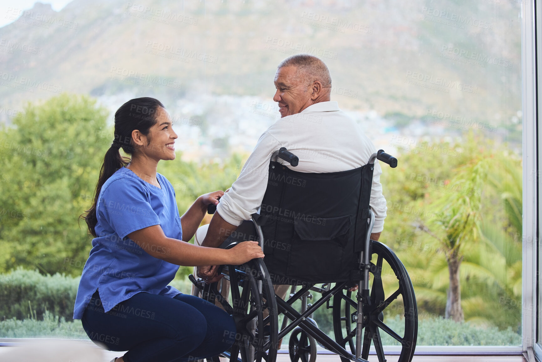 Buy stock photo Disability healthcare, doctor and senior patient with support from medical nurse in a wheelchair. Disabled elderly man consulting with a happy nurse or caregiver after an accident in a nursing home