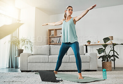 Buy stock photo Yoga, online workout and woman training with stretching exercise on the internet in living room of house. Girl doing pilates for focus, energy and fitness health with video on technology in home