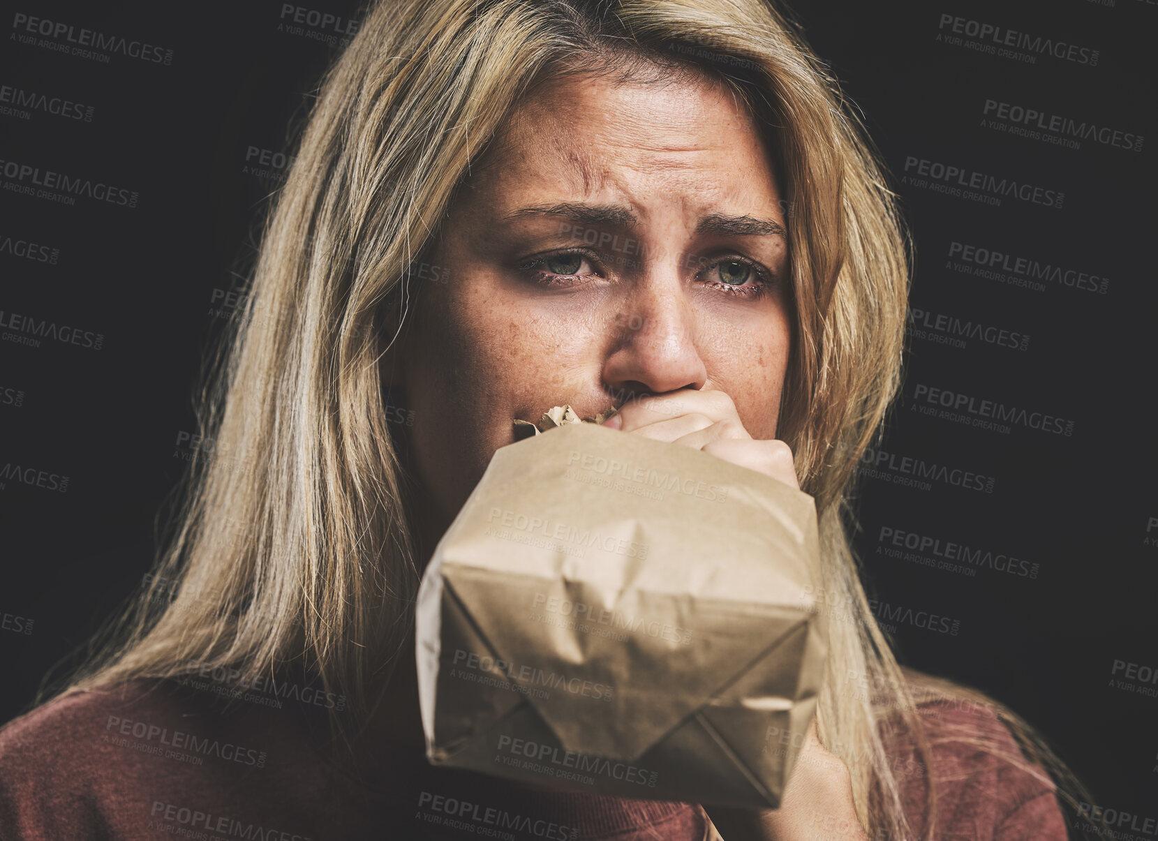 Buy stock photo Anxiety, nausea and woman with paper bag for stress and panic attack relief with black mockup. Girl suffering with trauma, psychosis and mental health trouble breath technique for calm mindset.