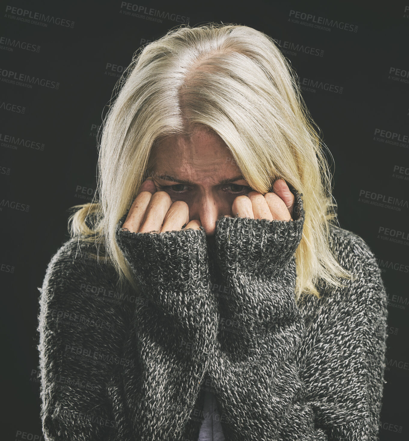 Buy stock photo Fear, mental health and dark depression for woman with social anxiety, scared mindset or personality disorder. Nervous breakdown, psychology or sad senior person with life problem on black background