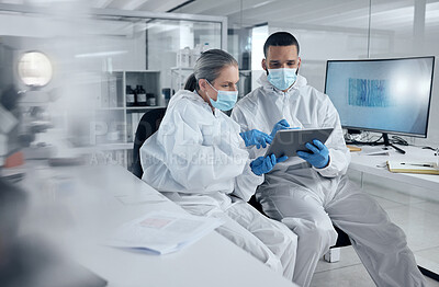 Buy stock photo Research, covid and tablet with doctors reading information for work discussion. Medical, team and PPE for safety, health and wellness while doing research on coronavirus together in lab at hospital