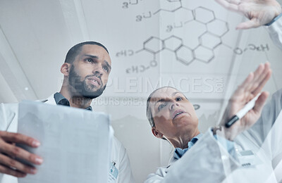 Buy stock photo Scientist team, science and chemistry formula on glass board while solving or discuss experiment or solution in a medical laboratory. Innovation, discovery and development with biology man and woman