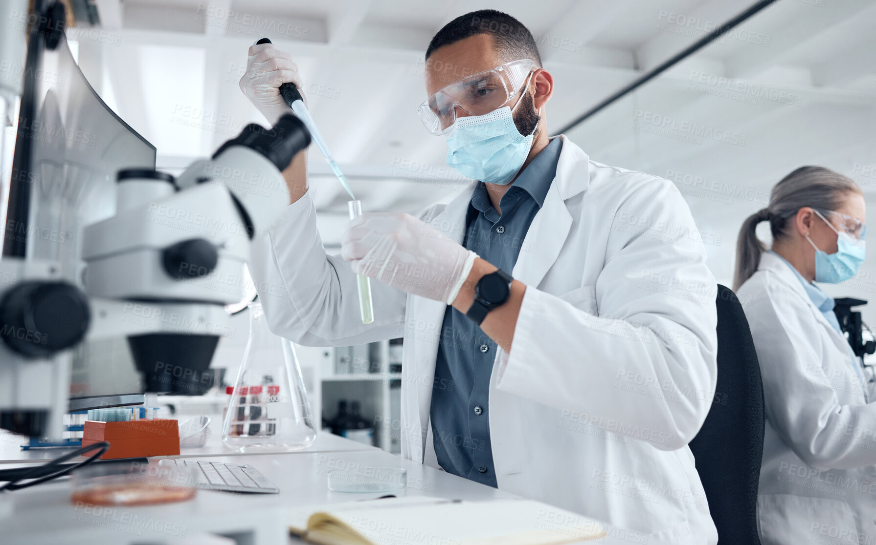 Buy stock photo Covid, lab mask and vaccine research man with medicine analysis test tube in medical facility. Development, innovation and professional expert working on new coronavirus breakthrough cure.


