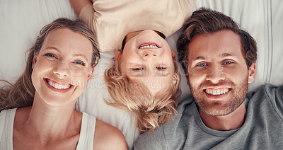 Buy stock photo Love, above and portrait of happy family relax on hotel bedroom for holiday vacation, peace and freedom in Canada. Mom, dad and child or kid smile, have fun and enjoy quality bonding time together