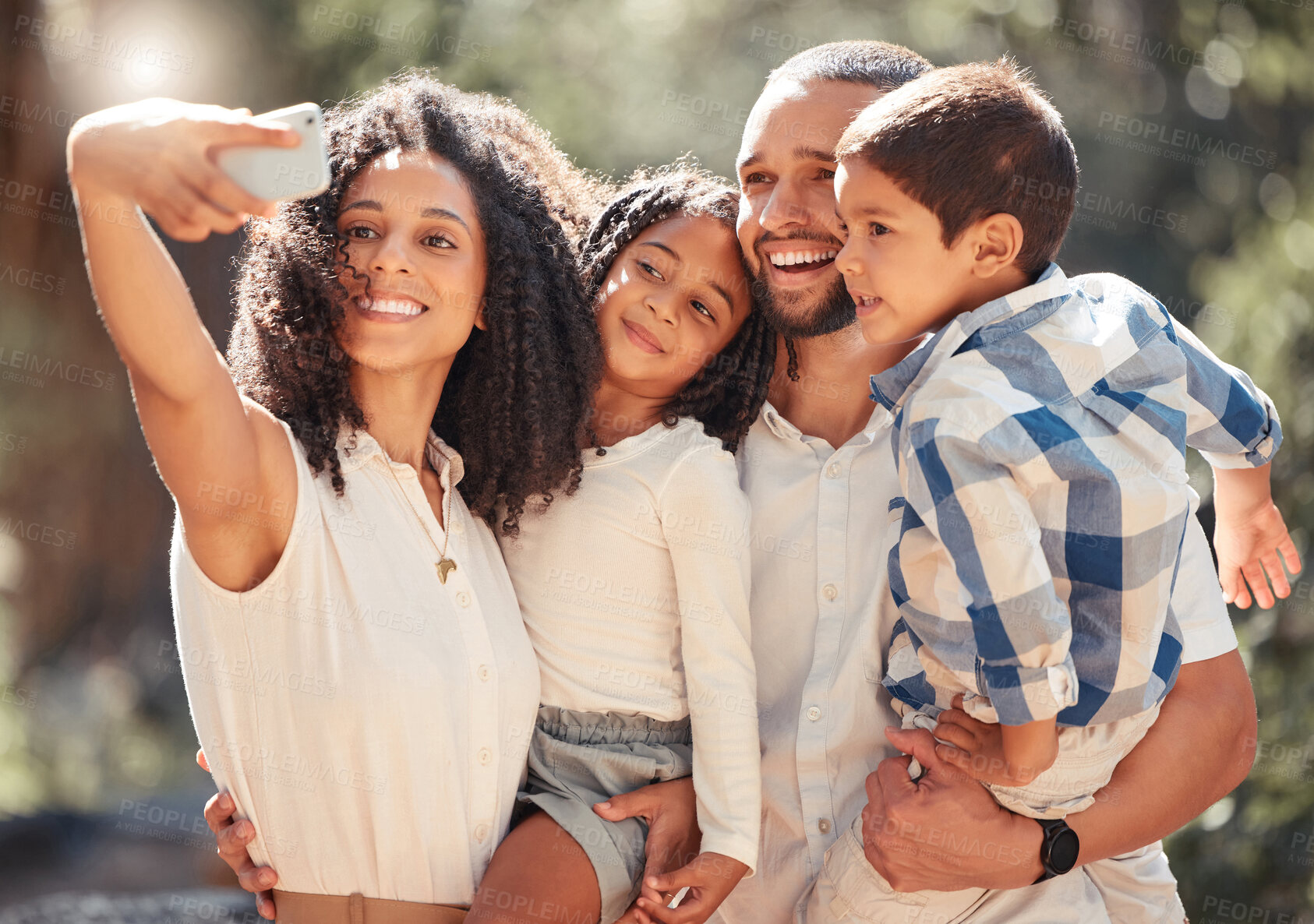 Buy stock photo Family selfie with smartphone in a park or nature for outdoor summer wellness, hiking and happy holiday memory on mobile digital gallery. Mother portrait photo of children and father with lens flare