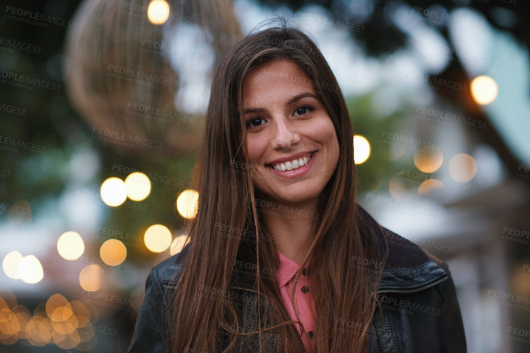 Buy stock photo Portrait beautiful woman smiling happy in city evening with lights in background