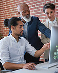 Business people using computer in office african american team leader man pointing at screen sharing ideas with colleagues 