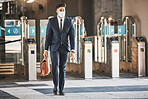 Covid, health and safety on public transport, a businessman walking in a bus or train station in a business suit and face mask. Career, travel and an office worker on his morning journey in the city.