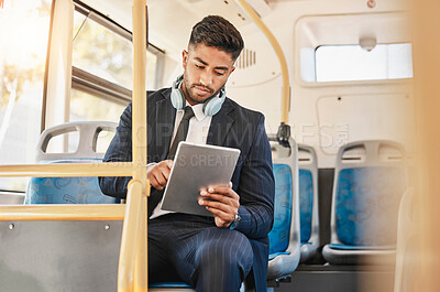 Buy stock photo Business man, using tablet and bus for travel to work, home or working location. Relax businessman using headphones, public transport to cbd and mobile device to update social media or check schedule