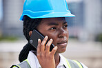 Architect engineer on a phone call conversation at a construction site building working in a safety helmet. Architecture and industrial designer in a serious discussion about engineering project