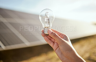 Buy stock photo Light bulb, solar panel and farmer hand with energy saving, electricity on sustainable agriculture farming for eco friendly idea. Sustainability, clean energy and carbon capture for green development