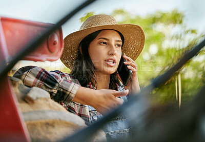 Buy stock photo Sustainability farmer, worker and woman on a phone talking and planning a plant growth strategy. Sustainable, eco friendly farm hand on a work call about farming, agriculture and countryside project