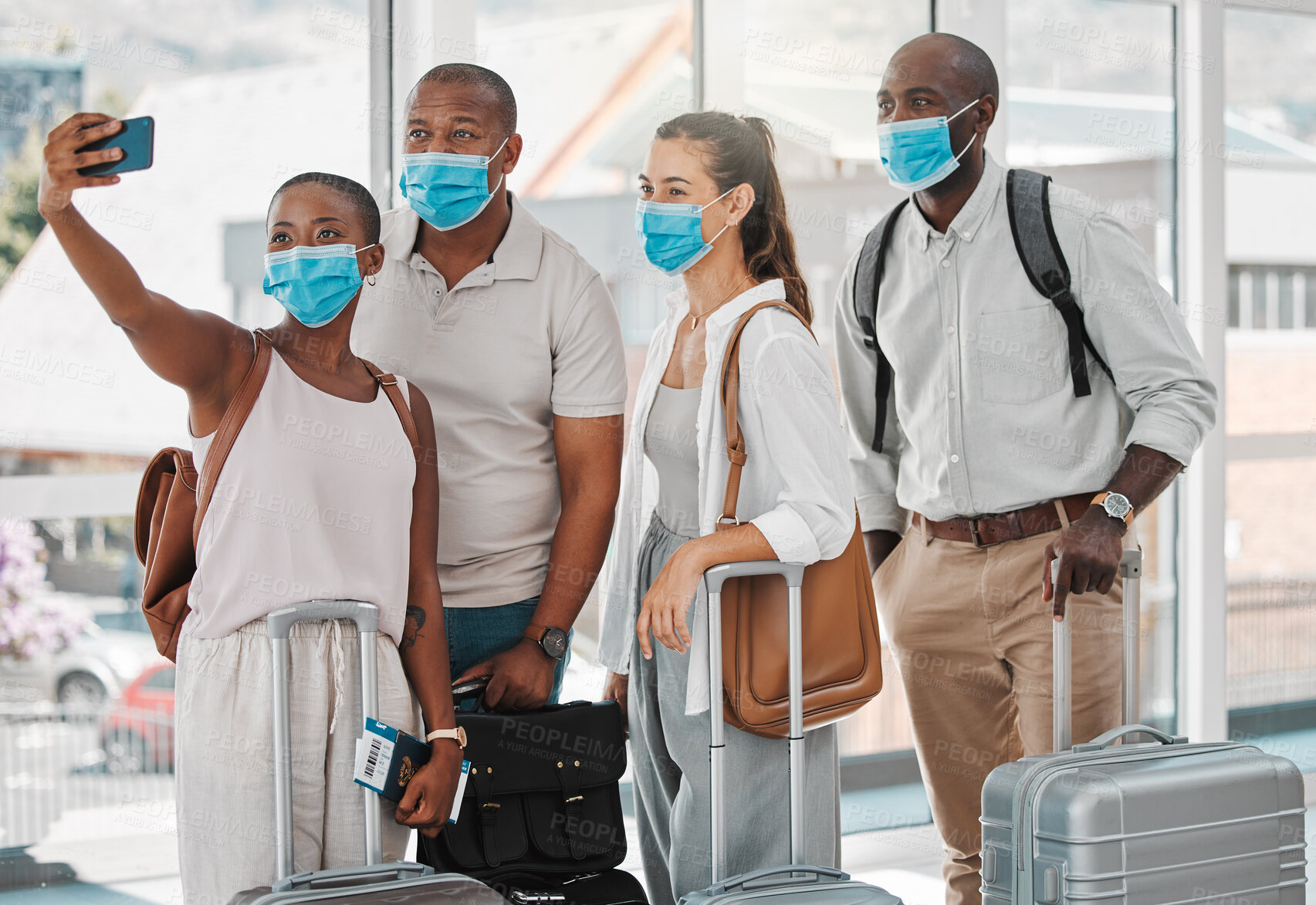 Buy stock photo Travel people taking selfie with covid face mask at the airport on their trip, travel or holiday overseas. Group of people or friends with suitcase, phone and social media memories while on vacation