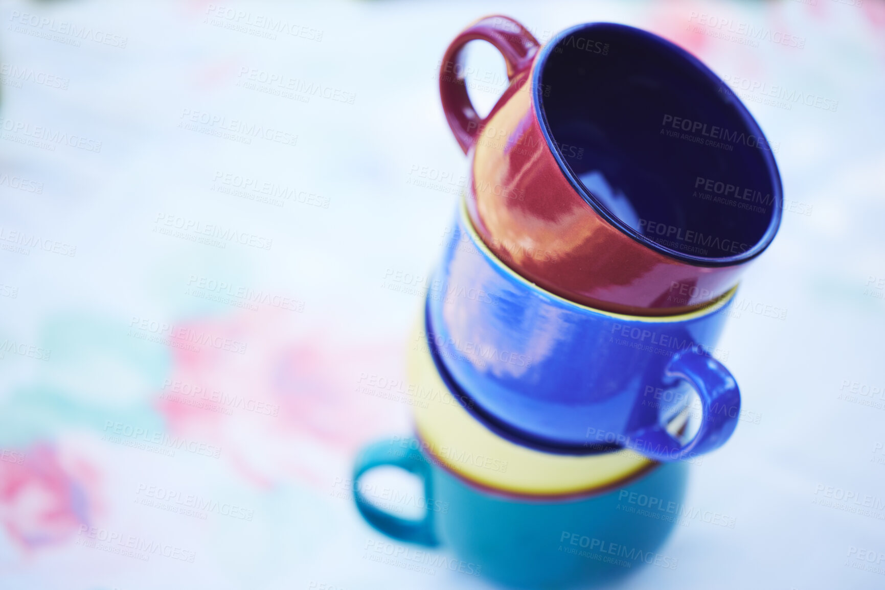 Buy stock photo Group of cup for coffee or tea picnic, breakfast or food and drink catering event. Stack of colorful ceramic kitchen mug on creative park, restaurant or zen garden table with flower and plant design