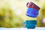 Cup for coffee, tea or party catering set for a calm morning in a backyard or park with a hot drink. Outdoors porcelain or ceramic for a relax, zen and quiet nature in summer with zoom bokeh