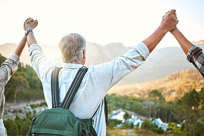 Buy stock photo Happy senior man hiking with friends, a celebration of the mountain view after holiday adventure trail in nature. Exercise to stay active, fit and healthy for lifestyle of wellness into retirement
