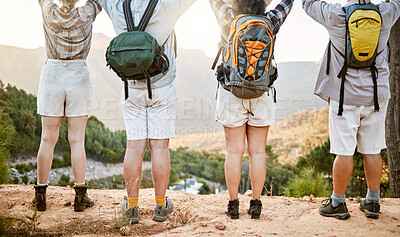 Buy stock photo Fitness group celebrating on hike in nature, enjoying hiking view on a mountain on a wellness getaway vacation together. Back of friends walking on weekend and relaxing on summer holiday