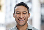 Happy, smile and face portrait of a man with a vision, mindset and motivation for success. Young entrepreneur or corporate professional businessman smiling in happiness over city street background.