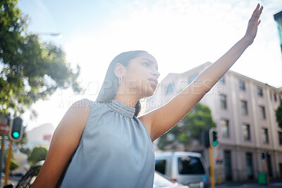 Buy stock photo Travel with taxi, cab or uber in a city for business woman to commute to work, airport or hotel with transport. Young female worker stretching hand in town street, road or sidewalk for trip outside