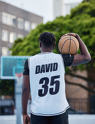 Buy stock photo Basketball, sports and fitness exercise of a sport player on an outdoors court for a workout. Back of a strong man and athlete with a ball ready to start cardio, active or game match training outside