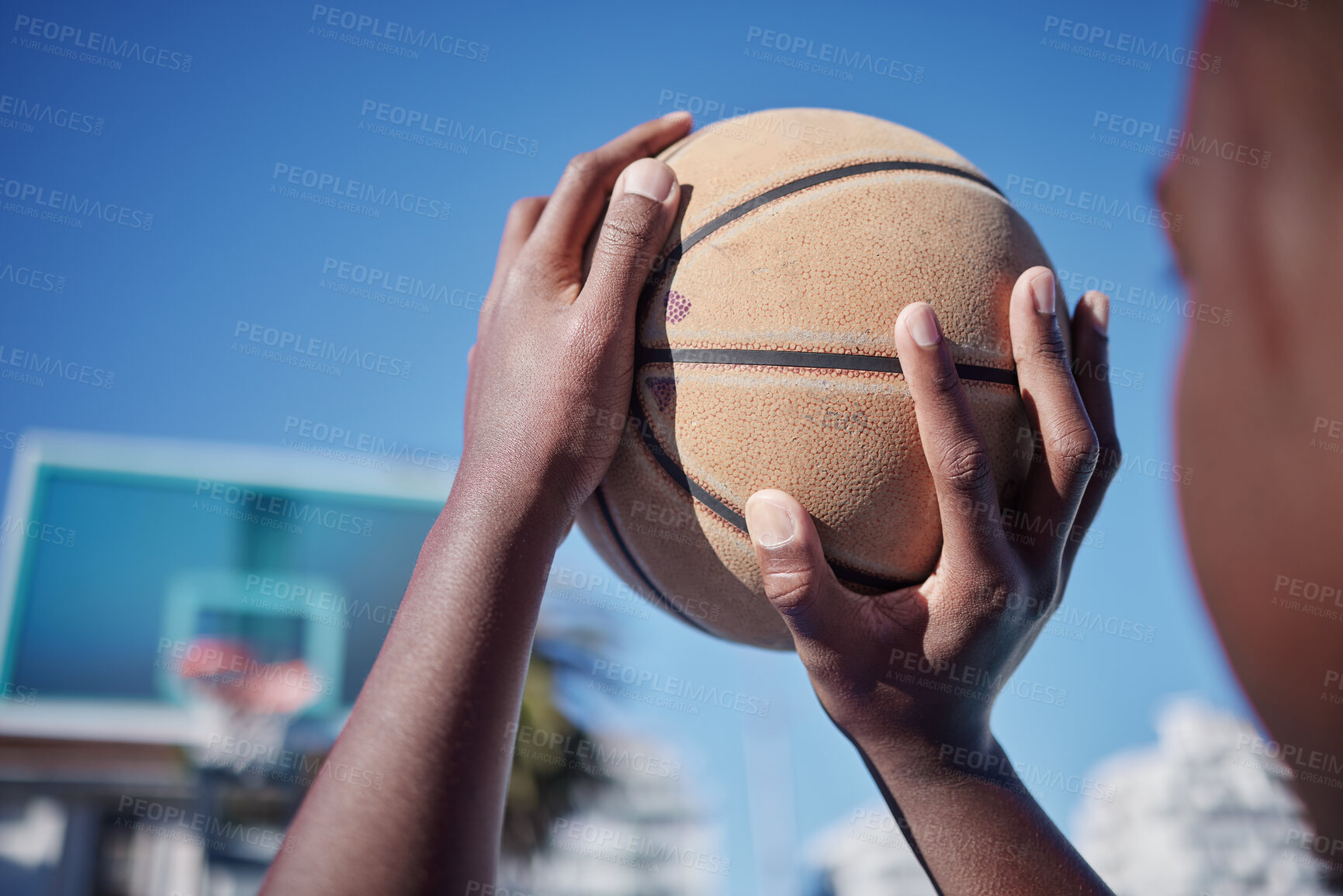 Buy stock photo Basketball court, sports man or fitness with motivation, vision or wellness goal in training, workout or exercise. Closeup player or competition athlete hands and basket ball shooting for net in game