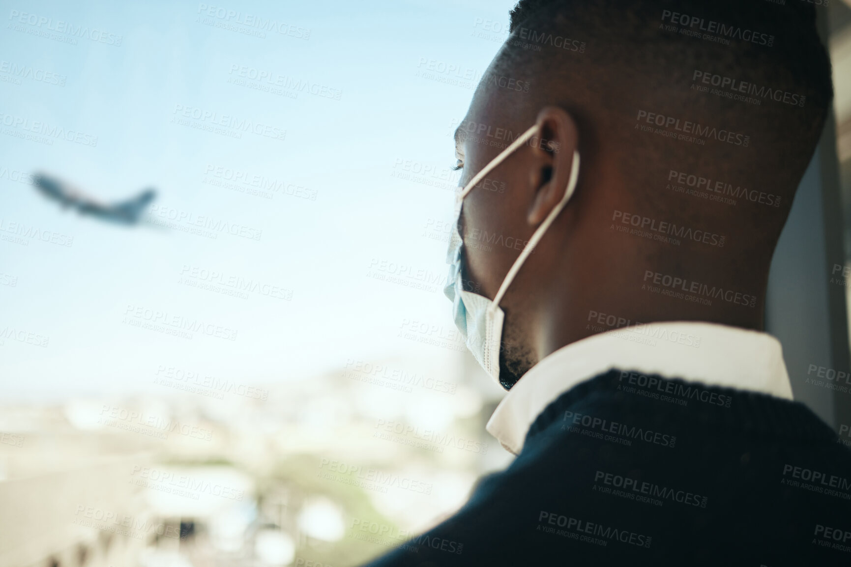 Buy stock photo Businessman in an airport for work travel during covid with a mask and plane fly in the background. Entrepreneur, employee or corporate professional watching an airplane while waiting to board flight