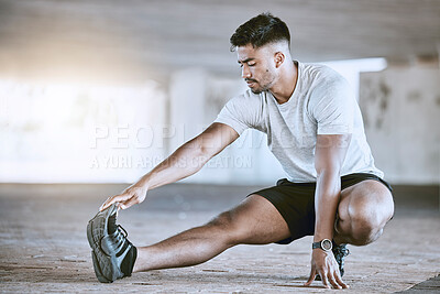 Buy stock photo Runner stretching legs for exercise, workout and fitness training for sport performance in an urban city. Motivation, active and running wellness athlete ready for sports run, marathon or health jog