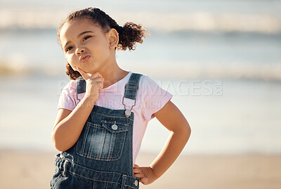 Buy stock photo Thinking child, planning and in doubt at beach front on vacation in Mexico. Young girl learning independence, using imagination and ideas for fun play on travel to ocean or sea with cute face


