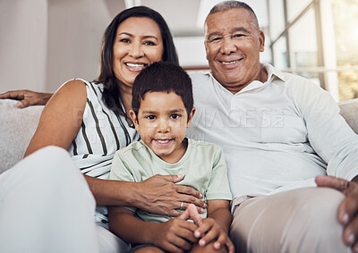 Buy stock photo Family, child and grandparents or foster parents with adopted child sitting on the sofa at home with smile and love. Portrait of boy kid with man and woman parents bonding in their puerto rico house