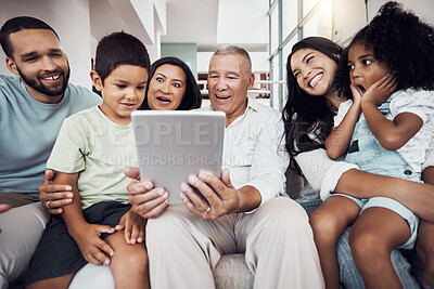 Buy stock photo Family, home and fun people with tablet streaming a movie, subscription video or show online. Love, surprise and happy big family on a sofa smile while bonding, relax and enjoy quality time together