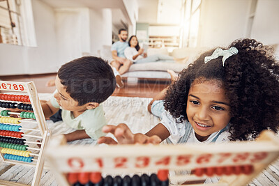Buy stock photo Children, education and abacus with a girl and boy learning maths on the floor of their living room at home. Kids, study and homework with a brother and sister in a house for growth and development