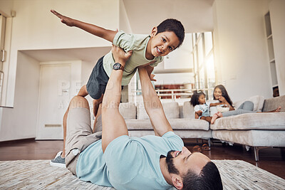Buy stock photo Happy family, father and son playing on a living room floor, relax and cheerful while bonding in their home together. Learning, flying and portrait of happy child enjoying a flying game with dad
