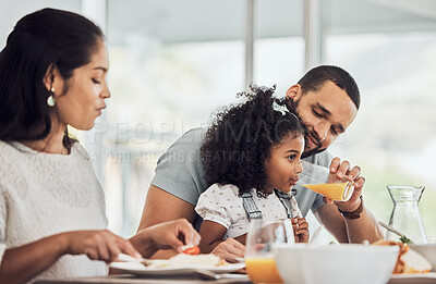 Buy stock photo breakfast juice, vitamin c and child, family or father help kid drink for growth development and healthy lifestyle. Guatemala parents, mother or dad eating healthy food or lunch together with girl