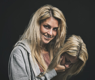 Buy stock photo Mental health, schizophrenia and bipolar with an insane woman in studio on a dark background for anxiety, fear or paranoia. Psychology, crazy and mad with a mentally ill female holding her own head