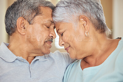 Buy stock photo Senior couple, forehead touch and love in house or Indonesian home living room in support, trust and security. Zoom, face and retirement elderly man and happy woman in marriage therapy and counseling