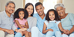 Portrait of happy family time in living room sofa with smile, hug and bonding for love, relax and happiness. Grandparents, parents and children together relaxing in family home, home or house