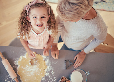 Buy stock photo Food, family and portrait of girl baking with grandmother in kitchen, happy, relax and prepare cookies together. Learning, growth and child development by kid and granny have fun with shape and flour