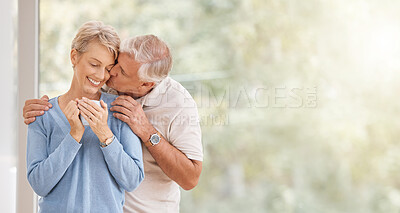 Buy stock photo Coffee morning, kiss and senior couple with smile during breakfast in retirement house at window with mockup space. Elderly man and woman with love and hug during holiday in Portugal and drink of tea