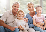 Portrait, kids and grandparents relax on a sofa, bonding and smiling in living room together. Family, happy and retirement with elderly man and woman enjoying free time and babysitting grandchildren
