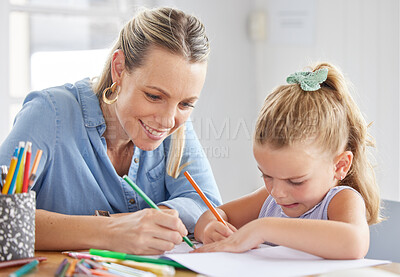 Buy stock photo A happy mother, girl child drawing on paper and coloring together with pencils for preschool homework. Children in kindergarten, having fun being creative and learning creativity art skills from home
