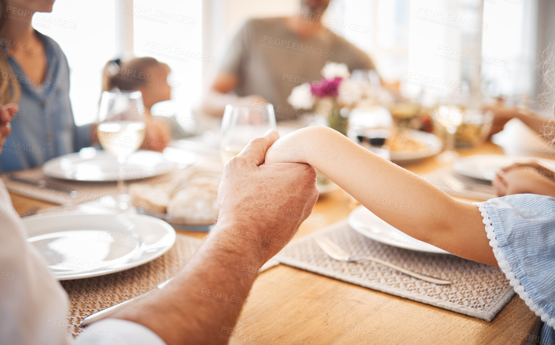 Buy stock photo Family, holding hands and thanksgiving lunch prayer in house, home and restaurant with men, women and children. Zoom, worship praying community with kids, parents or seniors for festive food at table