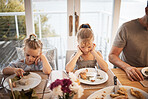 Picky eating kids frustrated with lunch food, fussy at dinner table and struggle in family home with diet. Mad, moody and upset young girl children refuse to eat disgusting, dislike and annoyed meal