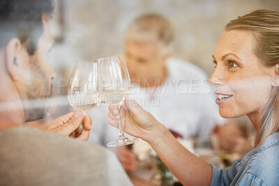 Buy stock photo Couple, smile and champagne toast at dinner celebrating in home. Cheers, love and man, woman and sparkling golden wine or alcohol, beverage or drink celebration at party, event or family gathering.
 