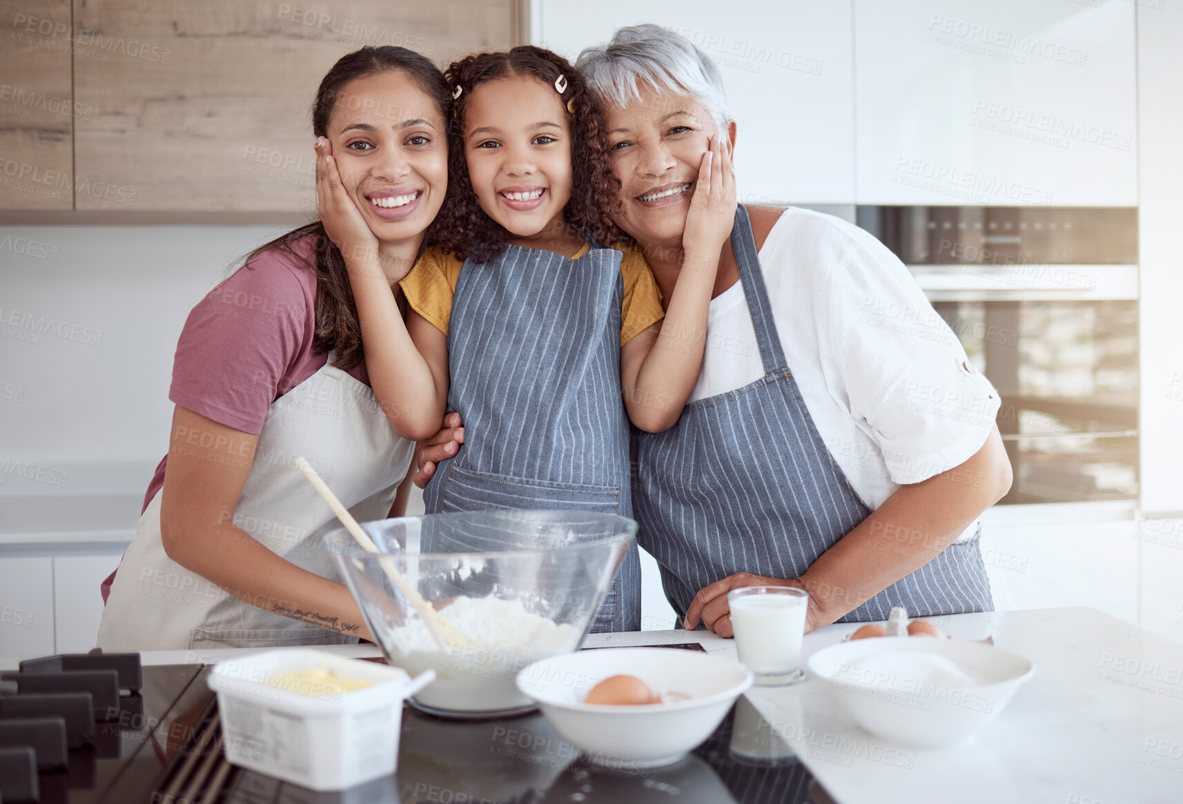 Buy stock photo Baking, cooking or girl bonding with family in kitchen for breakfast food or learning sweet dessert recipe in home. Brazilian mother, grandmother and women in hug with happy child for house portrait