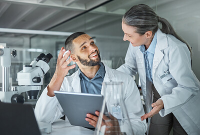 Buy stock photo Science, man and woman consulting in laboratory doing research in hospital. Technology, medical innovation and communication, university lab worker and scientist or mentor checking information online