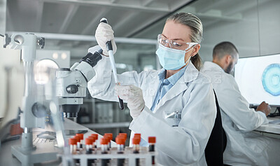 Buy stock photo Lab research, covid science and scientist working on medical blood development for future at work. Chemistry doctor with face mask for security from virus and chemical during biotechnology test