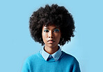 Black woman afro, portrait and serious face for vision in focus against a blue studio background. African female model in cool fashion with facial expression and cosmetic eyeshadow makeup on mockup